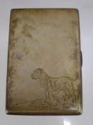 A Solid Silver Engine Turned Cigarette Case, the gilded cigarette case engraved with a spaniel,