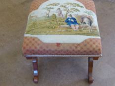 A Mahogany Stool on Cross Banded Supports, with turned stretcher and tapestry seat depicting a