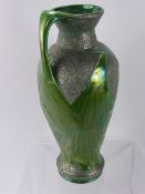 An Austrian Art Nouveau Ewer/Vase, with iridescent green leaf design over a textured surface