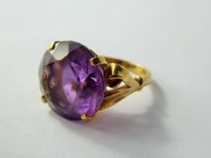 A Lady's 9ct Gold and Amethyst Ring, amethyst 16 mm, size O, approx 6.9 gms.