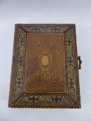 A Beautifully Worked Leather Bound Victorian Photograph Album, with many photographs of various