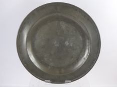 An English Pewter Single Reeded Charger, with marriage triad 'RPH' to rim, approx 38 cms dia,