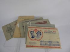 A Miscellaneous Collection of Cigarette Cards in Books, including aeroplanes, badges, air raid