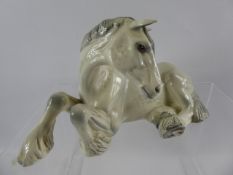 A Beswick Figure of a Resting Dapple Grey Cart Horse.
