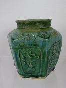 An Antique Chinese Green Glazed Pottery Ginger Jar, the jar depicting flowers, approx 13 cms.