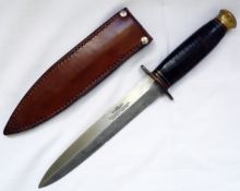 A WWII Fighting Knife by Southern a& Richardson, Sheffield, the knife has a hand crafted 6.75
