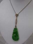 A Circa 1920's 18 ct and Platinum White Gold Jade and Diamond Drop Pendant, the pendant having