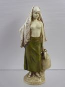 A Royal Dux Figurine, of a water carrier, approx 19 cms