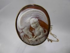 A Lady's Fine Antique Shell Cameo, the cameo depicting a feminine nude feeding a bird, approx 4 x 3.