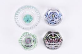 Three Whitefriars facetted glass millefiori paperweightsincluding a 25th jubilee paperweight, two