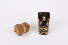 A tortoiseshell style etui case and anotherthe first of sloping form opening up to reveal a