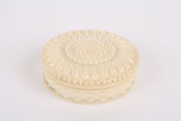 A pocket Georgian ivory compendium in ivory caseof circular form with compass/sundial and