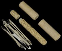 A cylindrical ivory needle case the larger plain outer case opening to reveal a Cantonese carved