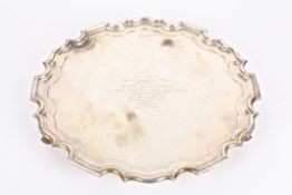 A heavy George V silver salver by Walker & Hall hallmarked Sheffield 1924, with pie crust edge,