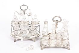 A Victorian silver condiment stand hallmarked London 1843 with family crest, carrying handle