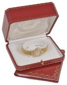 A ladies Cartier 18ct gold and diamond wrist watch c.1996 the engine turned dial with gilt Roman
