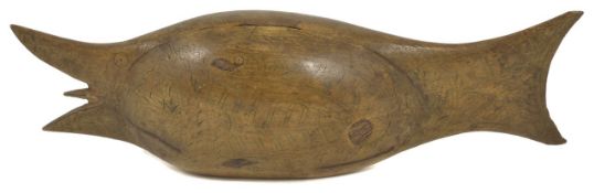 An unusual 19th century carved wooden scrimshaw style snuff box in the form of a stylised fish. 17