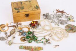 A small collection of silver and marcasite jewellery including an enamel bluebird brooch,