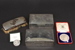 Two silver cigarette boxes, plain and engine turned together with a silver engine turned clothes