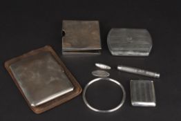 A collection of mainly Edwardian silver to include two hallmarked silver cigarette cases with engine