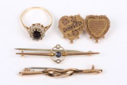 A Victorian 9ct gold double heart Mizpah brooch, a sapphire and pearl Edwardian 9ct bar brooch,