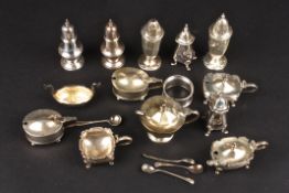 A collection of assorted silver cruets sets comprising salts, pepperettes and mustard pots, most