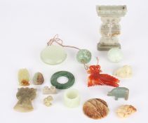 A collection of assorted modern Chinese carved jade and hardstone objets d'art including pendants, a