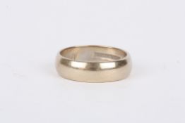 An 18ct white gold wedding band. Size K. 4.5 grams.Condition: Good condition with no damage.