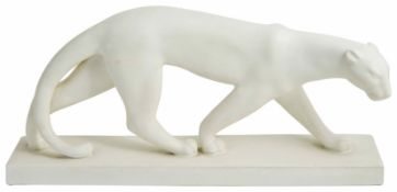 An Art Deco style pottery model of a panther in walking pose on a rectangular base, mark to base