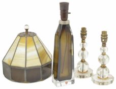 An Orrefors khaki glass lamp base of tapered form with original sticker, with associated glass