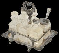 A Victorian silver and glass cruet set hallmarked Sheffield 1887, comprising three glass bottles
