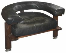 Esko Pajamies , a rosewood and black leather Polar chair