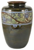A large Royal Doulton 1930s stoneware pottery vase with olive green ground, decorated with a