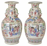 A pair of 19th century Canton famille rose baluster vases painted in the traditional palette with