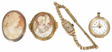 A Victorian carved classical style shell cameo brooch, yellow metal scroll mount, (tests for