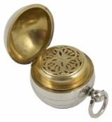 An usual Victorian silver sovereign holder/vinaigrette/locket hallmarked London 1872, of sphere
