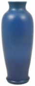 A Pilkingtons Royal Lancastrian vase of elongated ovoid form decorated in a mottled blue design