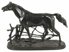 A late 20th century Russian cast iron model of a thoroughbred realistically modelled standing