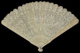 An early 20th century Chinese Canton carved ivory fan finely carved and pierced to front with