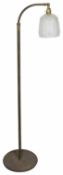 A brass plated telescopic reading lamp with adjustable fitting and frosted glass shade height