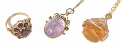 A 9ct gold mounted garnet cluster ring sold together with a 9ct gold mounted 'citrine' paste