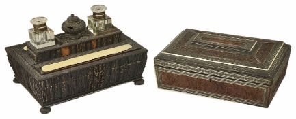A 19th century horn veneered desk stand and another with two glass inkwells and central horn ink