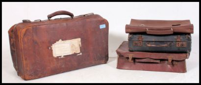 A good collection of vintage leather suitcases - travel trunks to also include attache cases and a