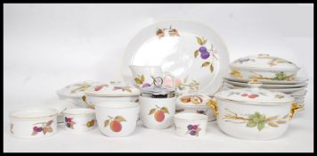 A Royal Worcester  Evesham pattern dinner service complete with plates, tureens etc.
