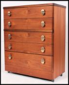 A vintage late 20th century / circa 1970's good quality teak 5 drawer tall boy chest of drawers