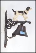 A 20th century cast metal wall hanging bell,