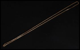 A long 750 / 18ct gold ladies box chain linked necklace complete with clasp. Total weight 10.