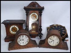 A collection of five clocks to include three mantle clocks, two being Napoleon eight day,