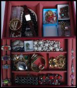 A collection of costume jewellery to include rings, bangles, necklaces, earrings etc,