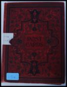 A small Edwardian postcard album containing 69 assorted Edwardian and early 20th century postcards,